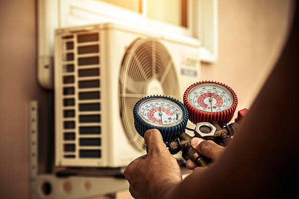 Professional Hvac technician working in Wingo, KY